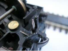 10mm steel pin inserted in Hornby Dublo plastic coupling.