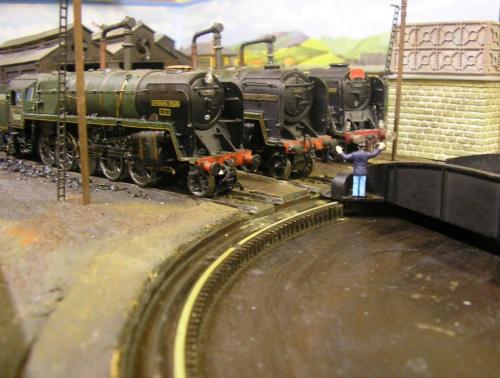 Three standards; standing in a row